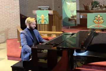 John Franek playing the piano